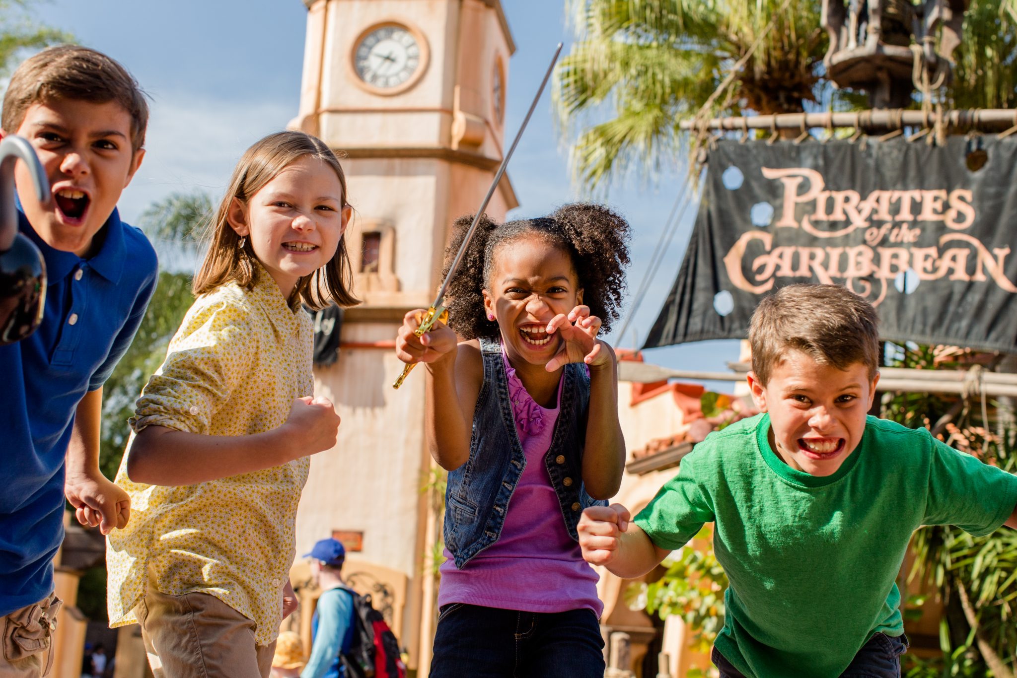 Four children outside the Pirates of the Caribbean Ride