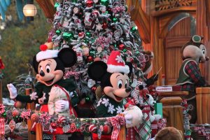 Mickey and Minnie Mouse on a parade float for the holiday parade